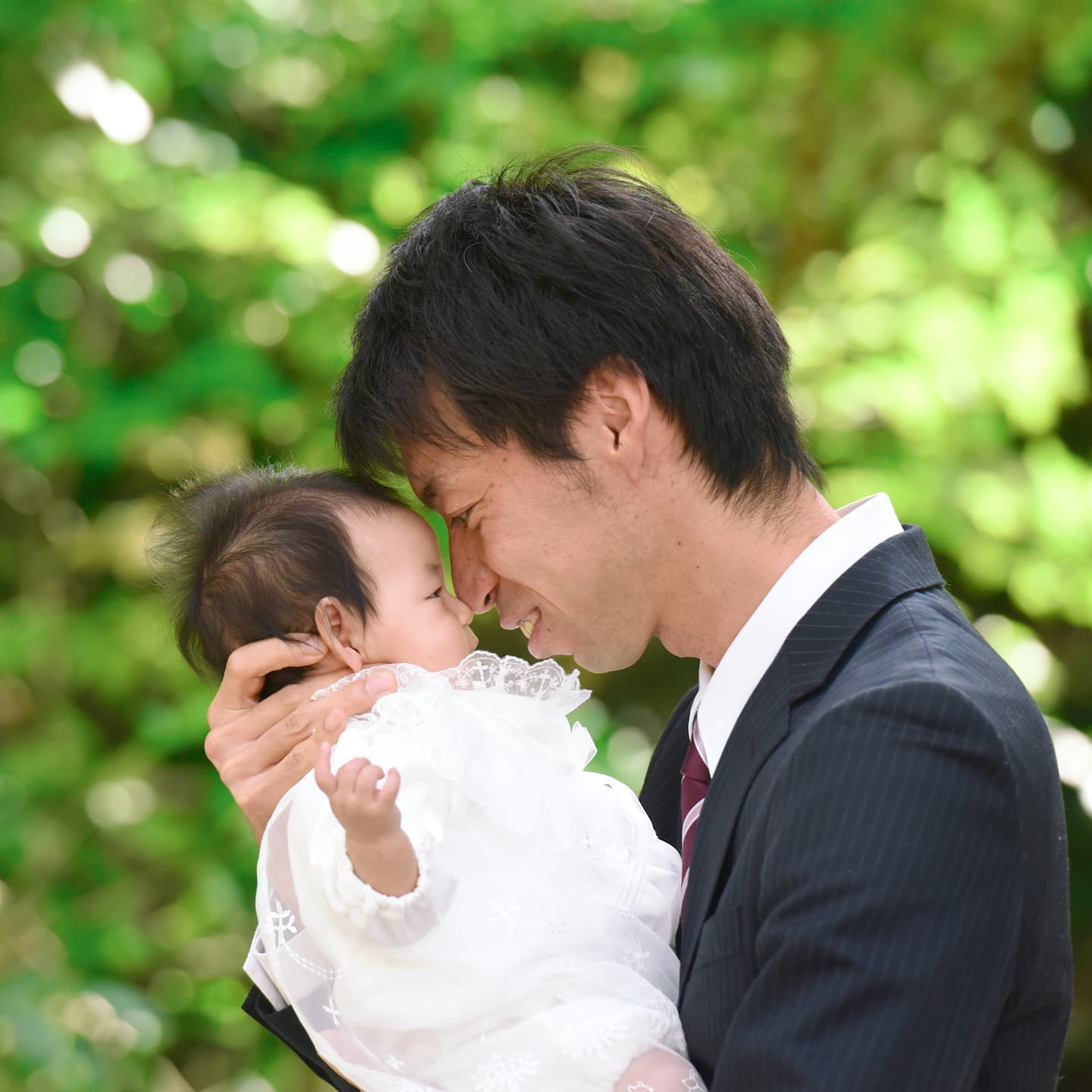 廣田神社でお宮参りをした赤ちゃんと家族