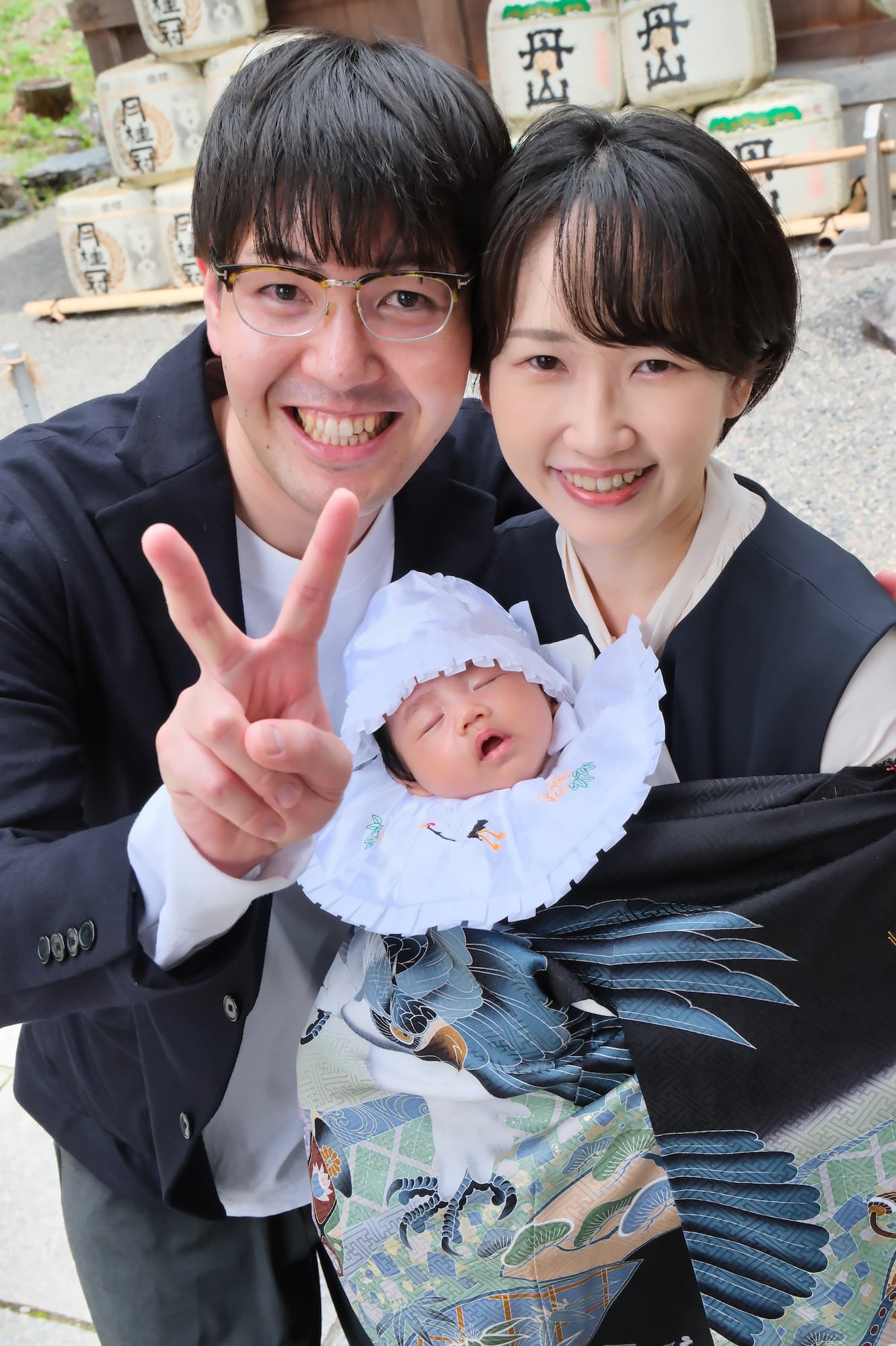 自然な笑顔のお宮参りの写真
